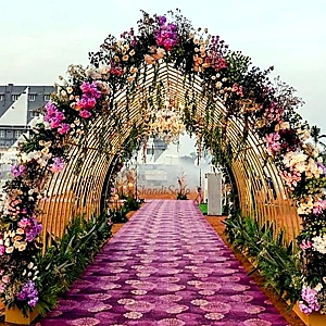 Elegant natural flower entry setup for special events at Rukramsera private theatre in Vijayawada