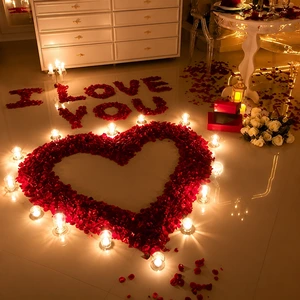 Romantic rose petals entry setup for surprise celebrations at Rukramsera private theatre in Vijayawada